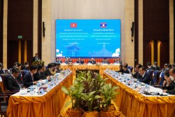 Quang cảnh Hội thảo lý luận lần thứ 9 giữa Đảng Cộng sản Việt Nam và Đảng Nhân dân Cách mạng Lào
